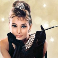 Audrey Hepburn Audrey Hepburn helped popularize the high-bosomed, sleeveless dress in 1962