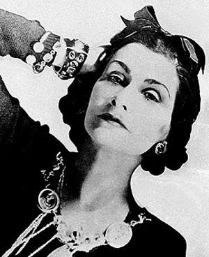 Coco Chanel wearing a hair bow Coco Chanel wearing a hair bow